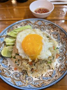 Rice, egg and cucumber. An example of a healthy meal.